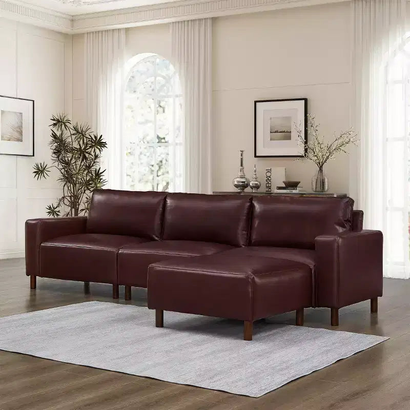 GDFStudio Arvin 112 Modernes 3-Sitzer-Sektionssofa aus Kunstleder mit Ottomane